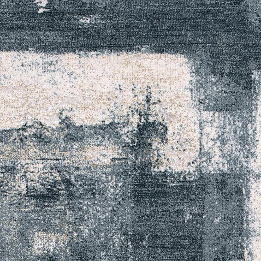 6' X 9' Blue And Ivory Abstract Dhurrie Area Rug