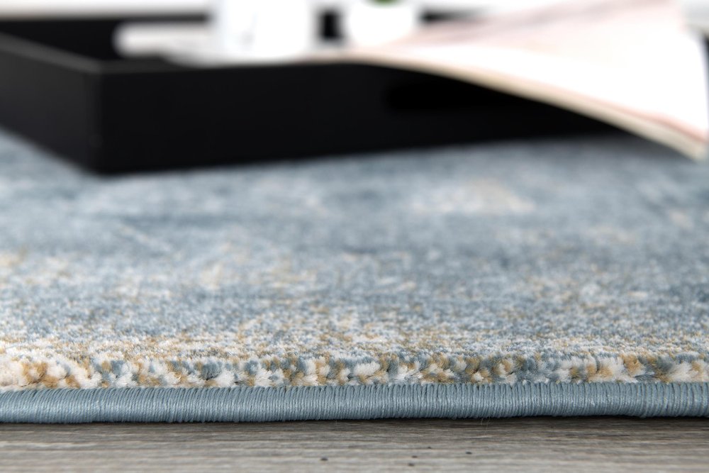 6' X 9' Blue And Ivory Abstract Dhurrie Area Rug