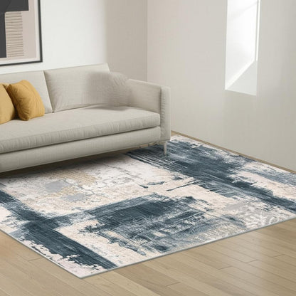 6' X 9' Blue And Ivory Abstract Dhurrie Area Rug