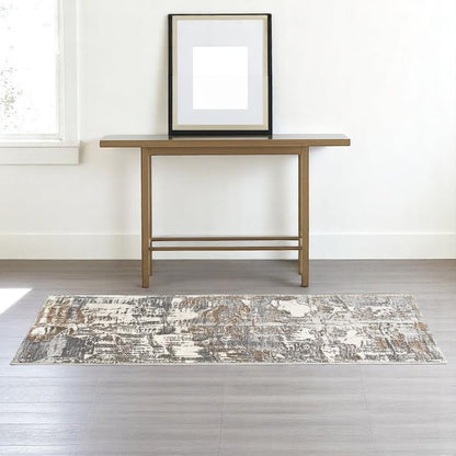 5' X 8' Beige And Gray Distressed Area Rug