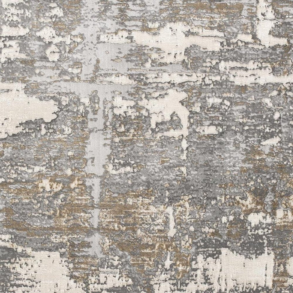 5' X 8' Beige And Gray Distressed Area Rug