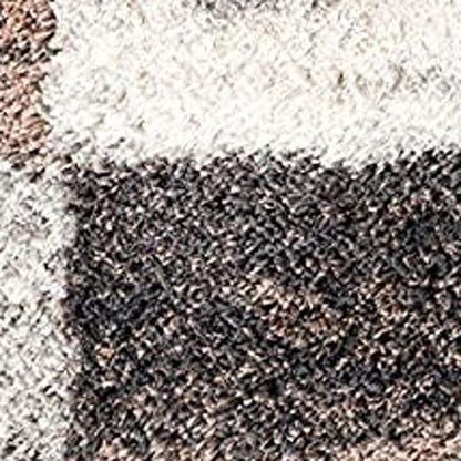 8' X 11' Beige and Ivory Patchwork Shag Area Rug