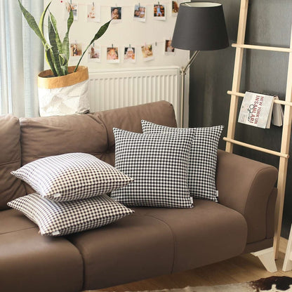 Set of Four Black And White Houndstooth Fabric Throw Pillow Covers