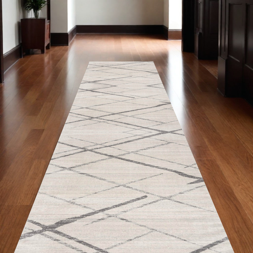 2' X 4' Gray and Ivory Geometric Area Rug