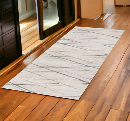 2' X 4' Gray and Ivory Geometric Area Rug