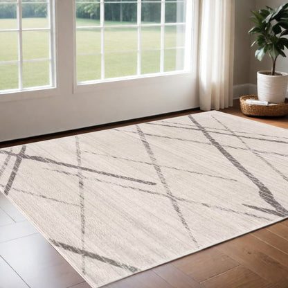 2' X 4' Gray and Ivory Geometric Area Rug