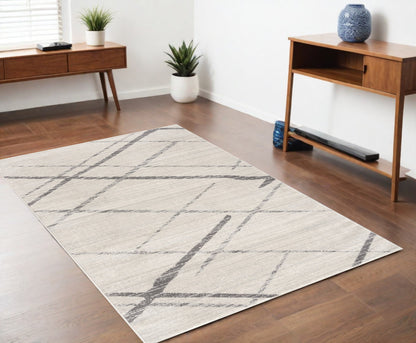 2' X 4' Gray and Ivory Geometric Area Rug