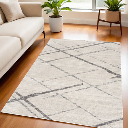 2' X 4' Gray and Ivory Geometric Area Rug