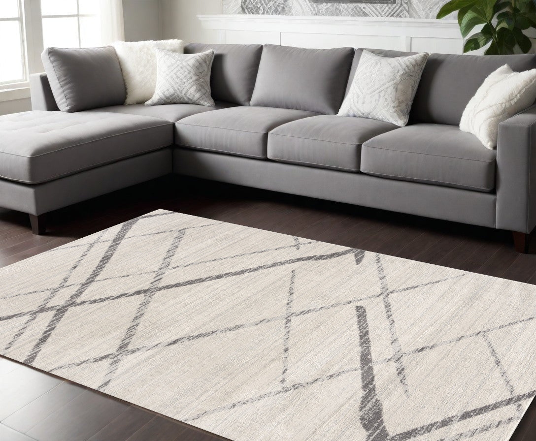 2' X 4' Gray and Ivory Geometric Area Rug