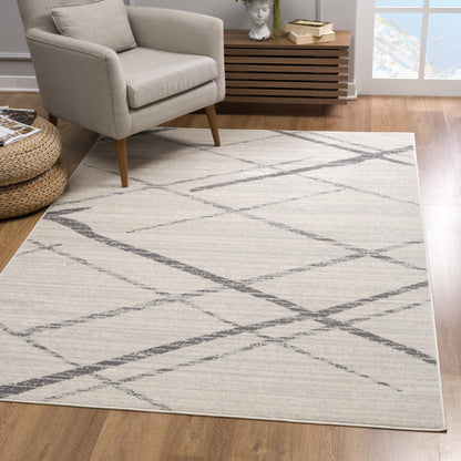 2' X 4' Gray and Ivory Geometric Area Rug