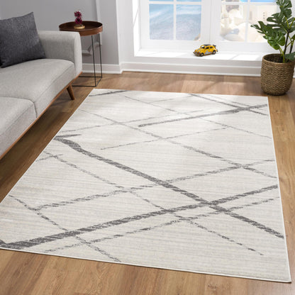 2' X 4' Gray and Ivory Geometric Area Rug