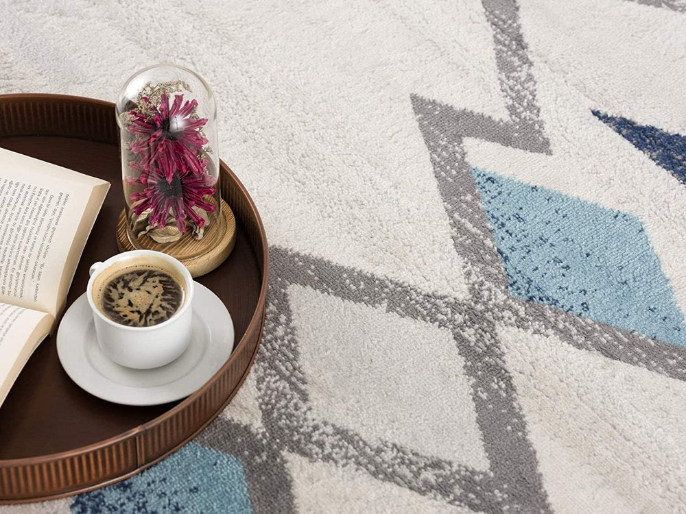 5' X 7' Blue and Ivory Southwestern Area Rug