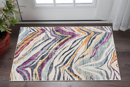 2' X 4' Blue and Gold Abstract Area Rug