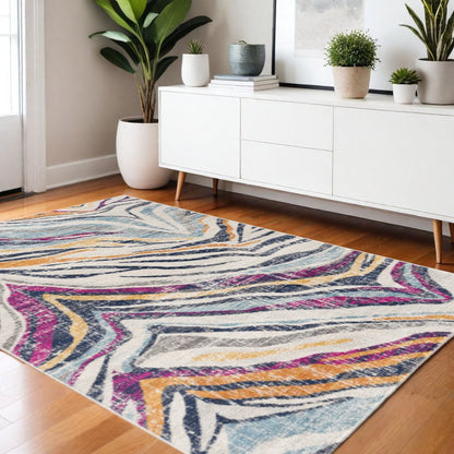 2' X 4' Blue and Gold Abstract Area Rug