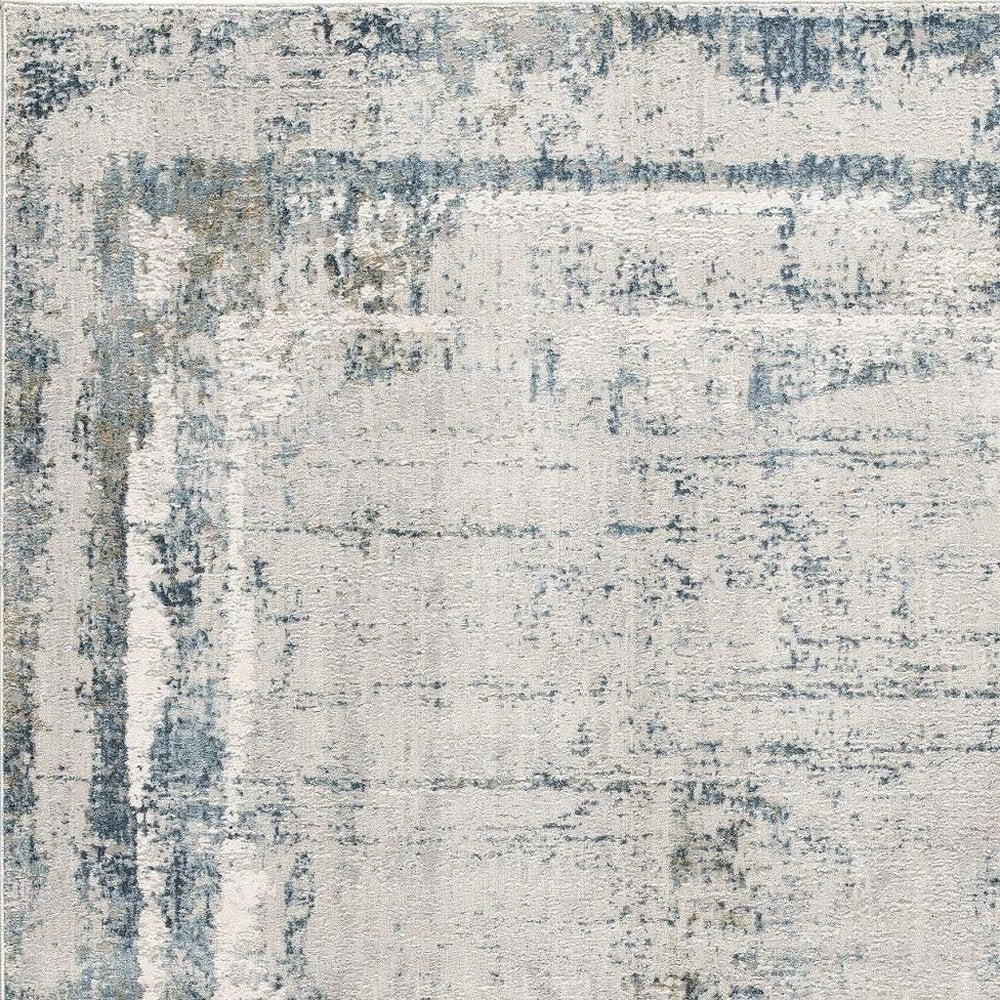 4' X 6' Blue and Ivory Abstract Power Loom Area Rug