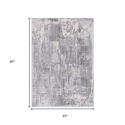 5' X 7' Blue Abstract Power Loom Area Rug