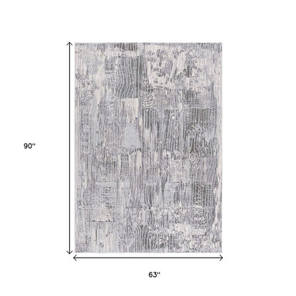 6' X 9' Blue Abstract Power Loom Area Rug