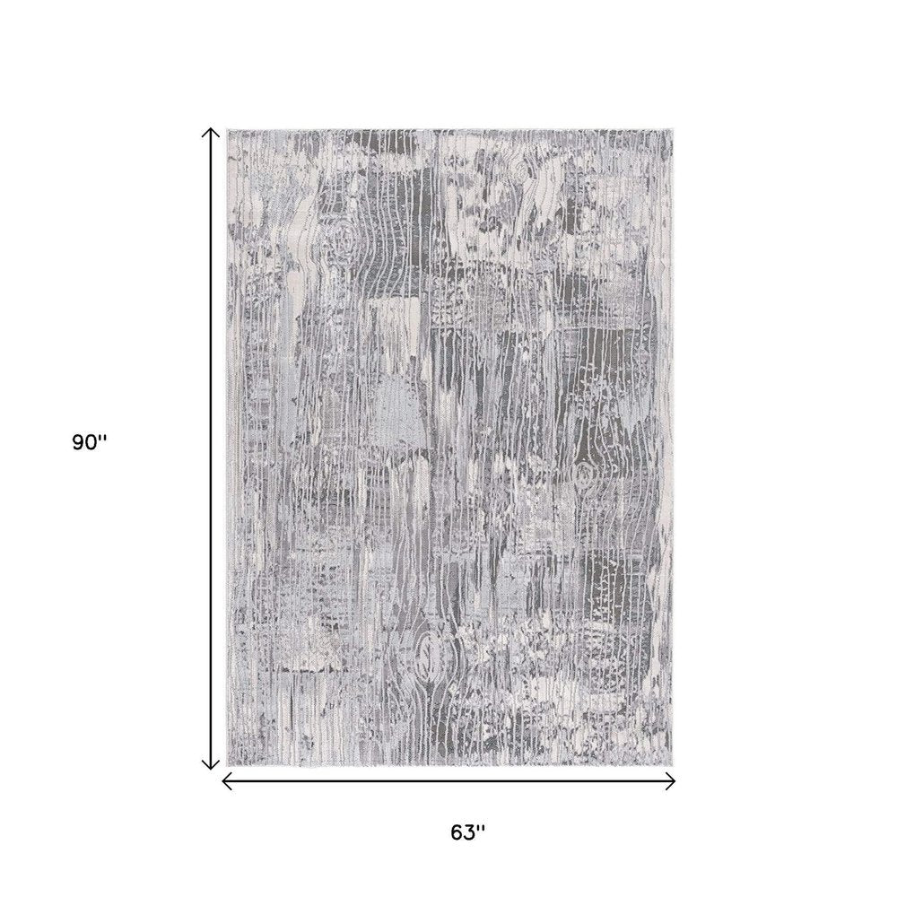 5' X 7' Blue Abstract Power Loom Area Rug