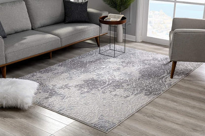 5' X 8' Cream And Gray Tinted Ogee Pattern Area Rug
