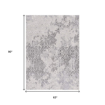 8' X 11' Cream And Gray Tinted Ogee Pattern Area Rug