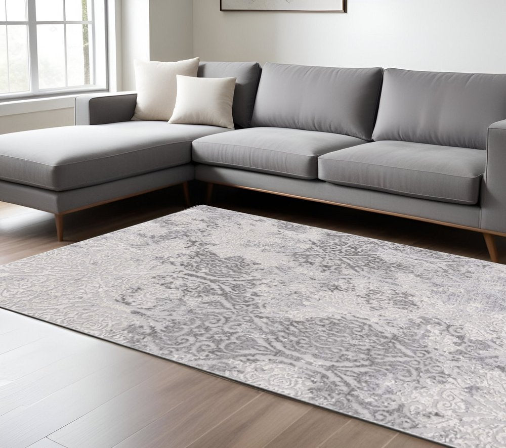 5' X 8' Cream And Gray Tinted Ogee Pattern Area Rug