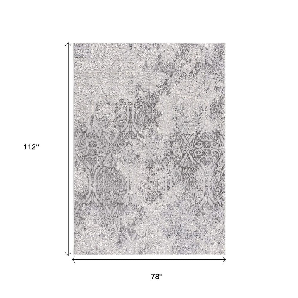 8' X 11' Cream And Gray Tinted Ogee Pattern Area Rug