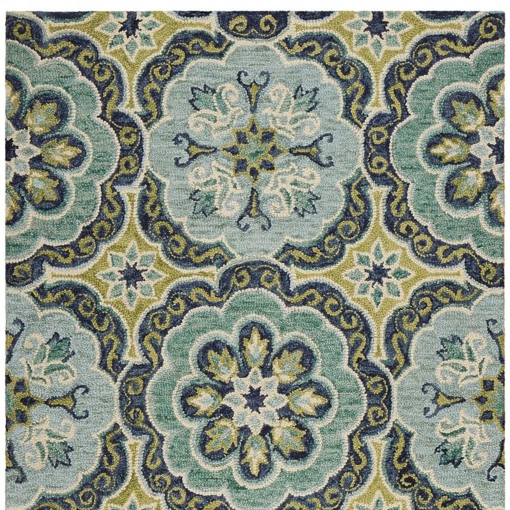 6' Green And Ivory Wool Geometric Hand Tufted Round Rug