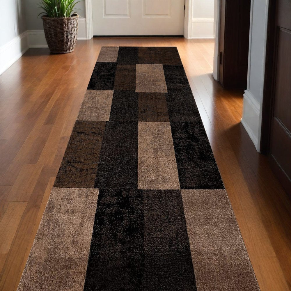 6' X 9' Black And Brown Geometric Distressed Area Rug
