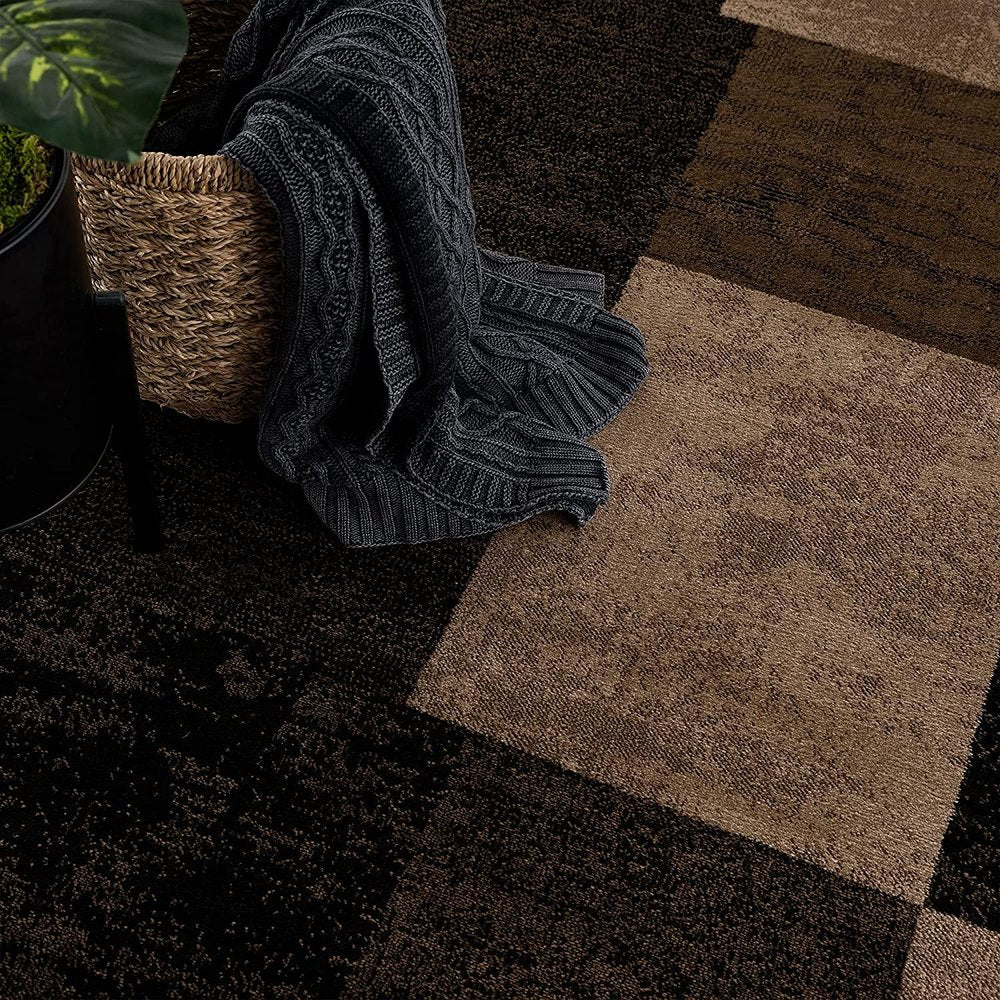 6' X 9' Black And Brown Geometric Distressed Area Rug