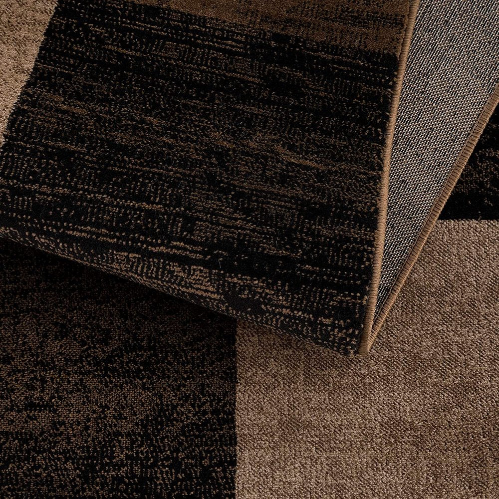 6' X 9' Black And Brown Geometric Distressed Area Rug