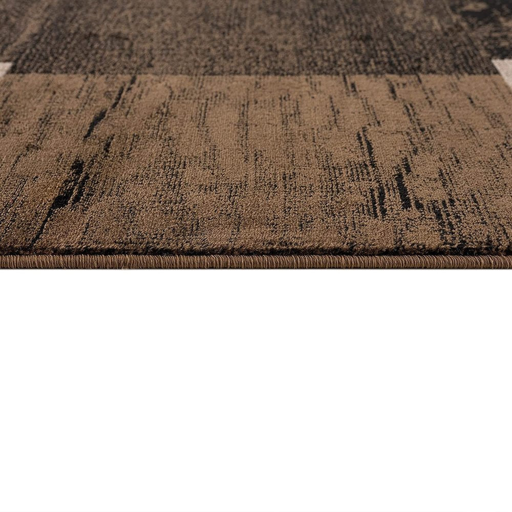 6' X 9' Black And Brown Geometric Distressed Area Rug