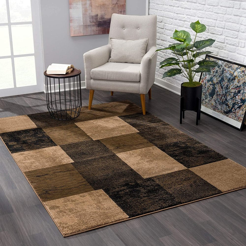 6' X 9' Black And Brown Geometric Distressed Area Rug