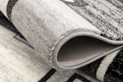 5' X 7' Gray And Black Geometric Distressed Area Rug