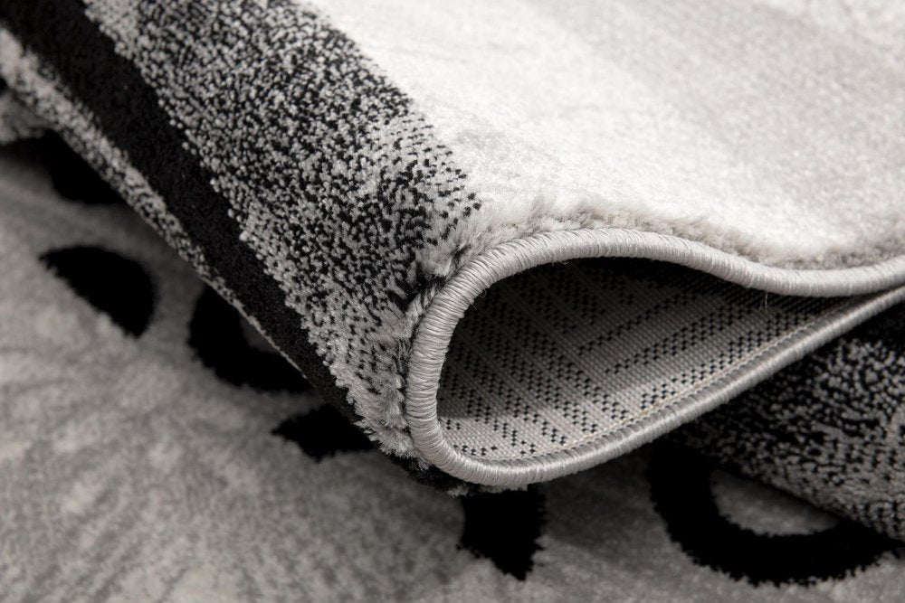 5' X 7' Gray And Black Abstract Area Rug