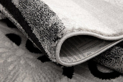 5' X 7' Gray And Black Abstract Area Rug