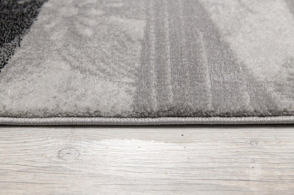 5' X 7' Gray And Black Abstract Area Rug