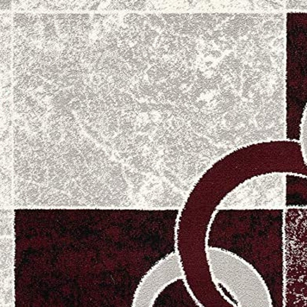 10' Red And White Abstract Runner Rug