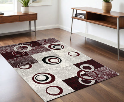 5' X 7' Red Abstract Dhurrie Area Rug