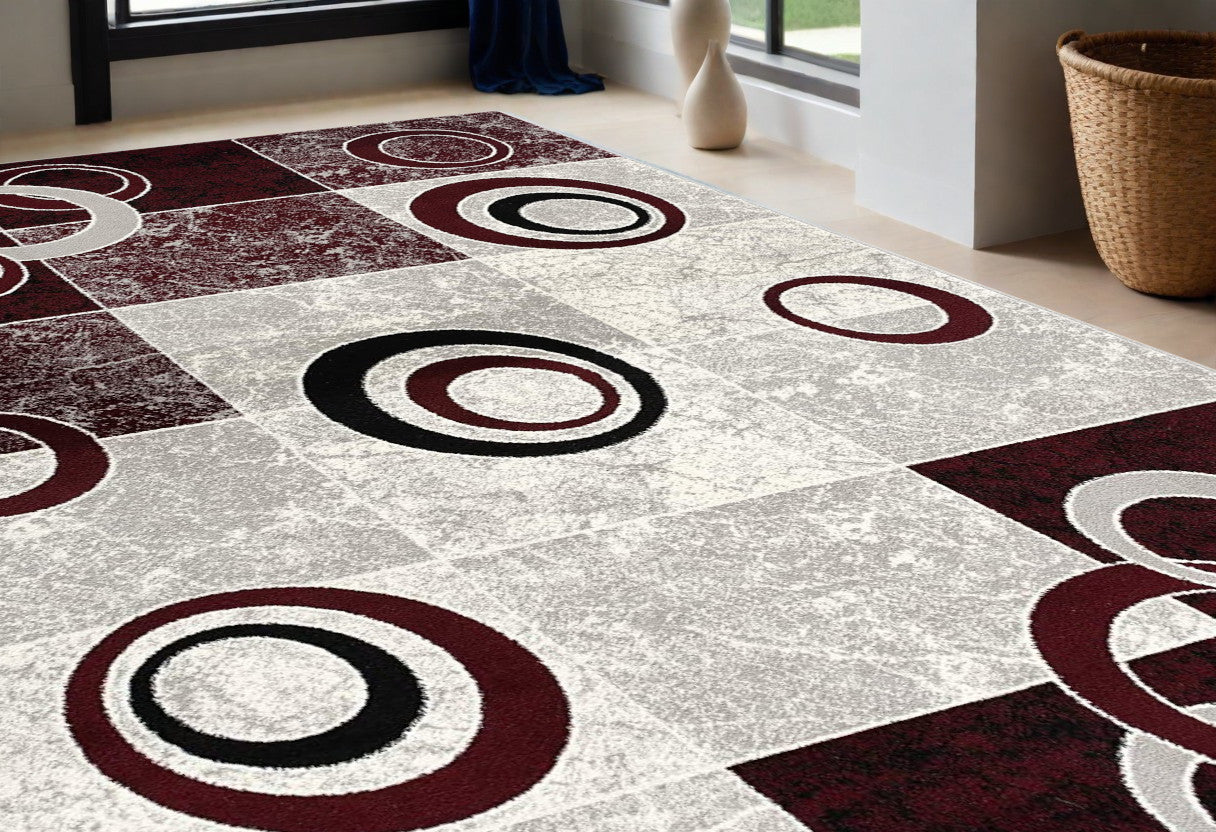 5' X 7' Red Abstract Dhurrie Area Rug