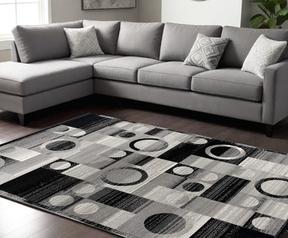 10' Black Gray and White Geometric Power Loom Distressed Runner Rug