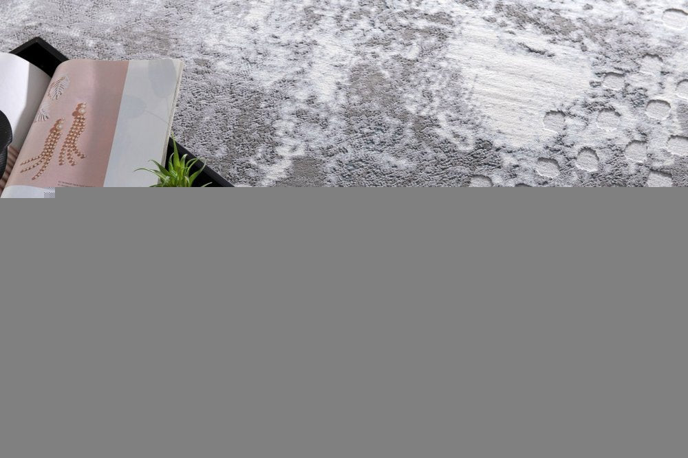 5' X 7' Gray And Ivory Abstract Area Rug