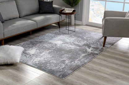 5' X 7' Gray And Ivory Abstract Area Rug
