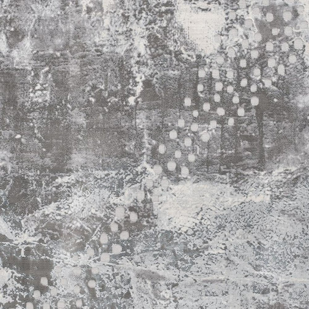 5' X 7' Gray And Ivory Abstract Area Rug