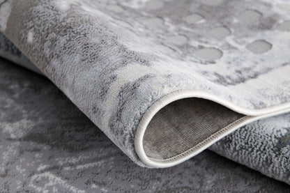 5' X 7' Gray And Ivory Abstract Area Rug