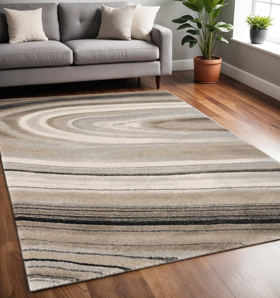 7' X 10' Cream and Tan Abstract Marble Area Rug