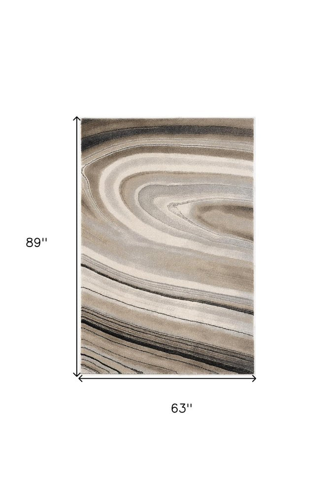 5' X 8' Cream and Tan Abstract Marble Area Rug