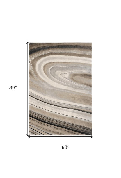 5' X 8' Cream and Tan Abstract Marble Area Rug