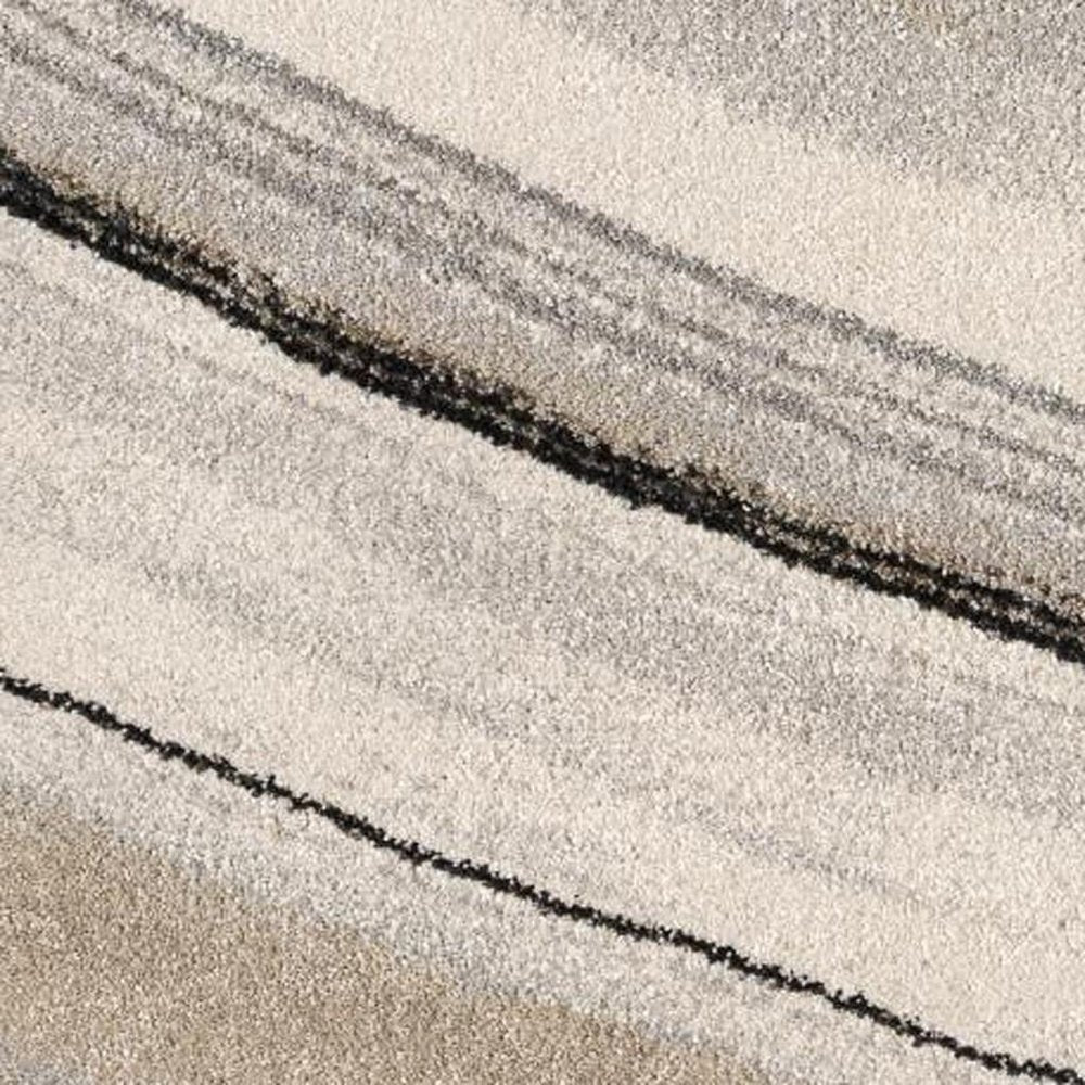 5' X 8' Cream and Tan Abstract Marble Area Rug