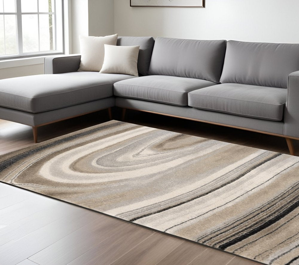 7' X 10' Cream and Tan Abstract Marble Area Rug