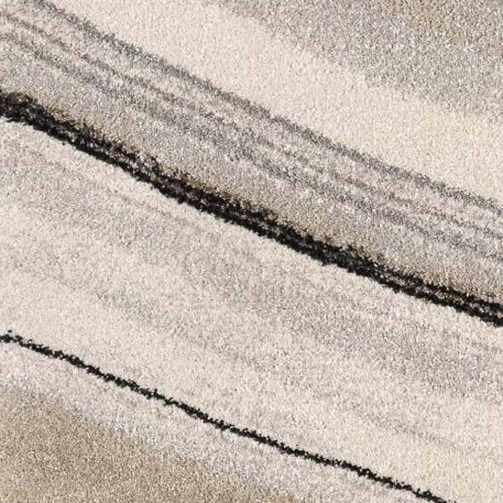 7' X 10' Cream and Tan Abstract Marble Area Rug